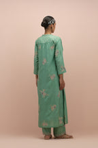 Jade green straight kurta set with all-over delicate embroidered flowers, highlighted with sequins and multi-colored beads.