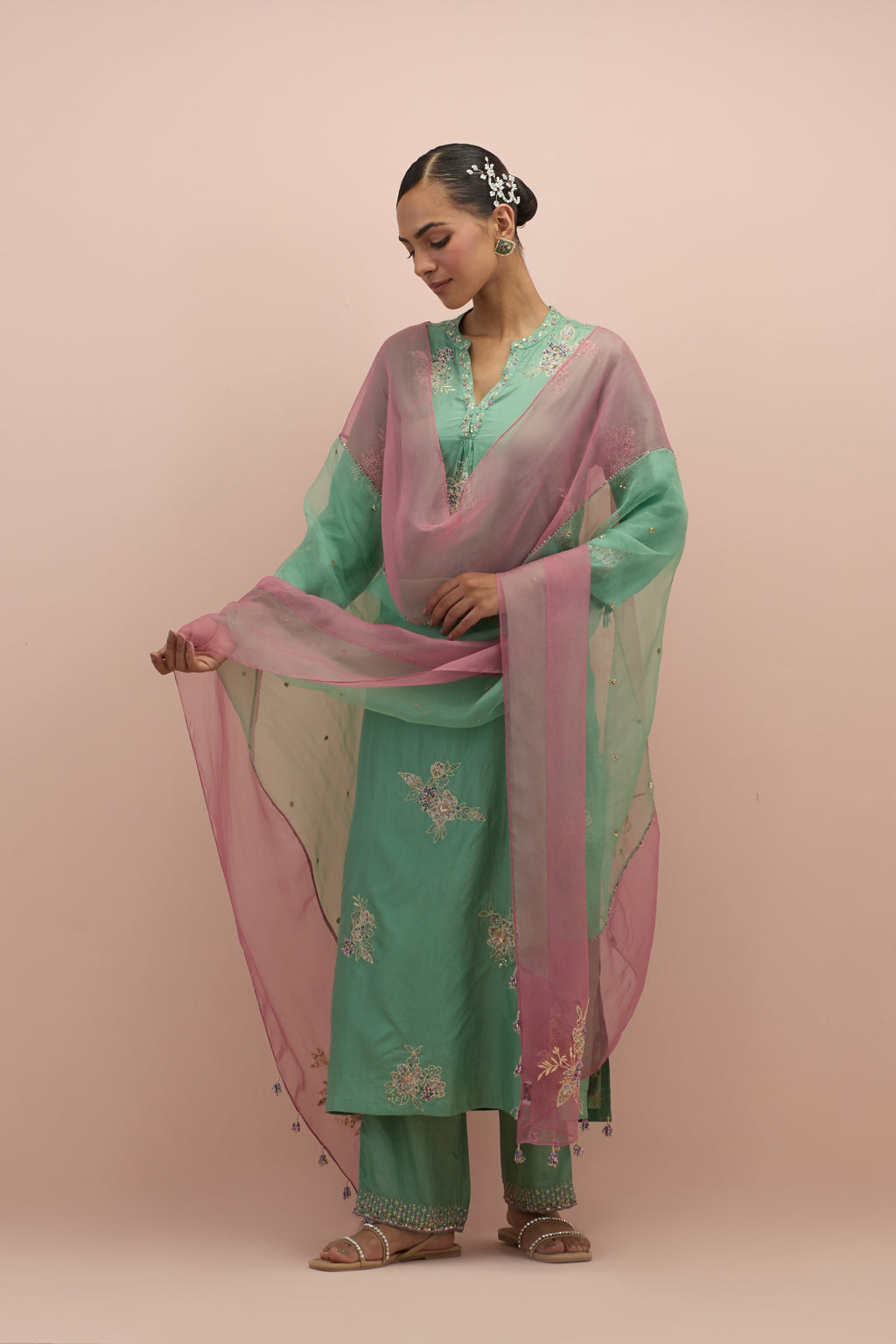 Jade green & salmon pink silk organza narrow dupatta, highlighted with all-over delicate sequins flower and hand block printed appliqué motifs at dupatta corners.