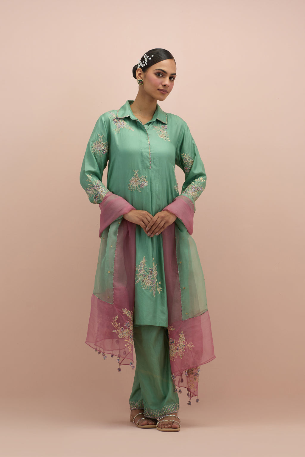 Jade green silk short shirt-kurta set with all-over appliqué flowers, highlighted with sequins and multi-colored beads.