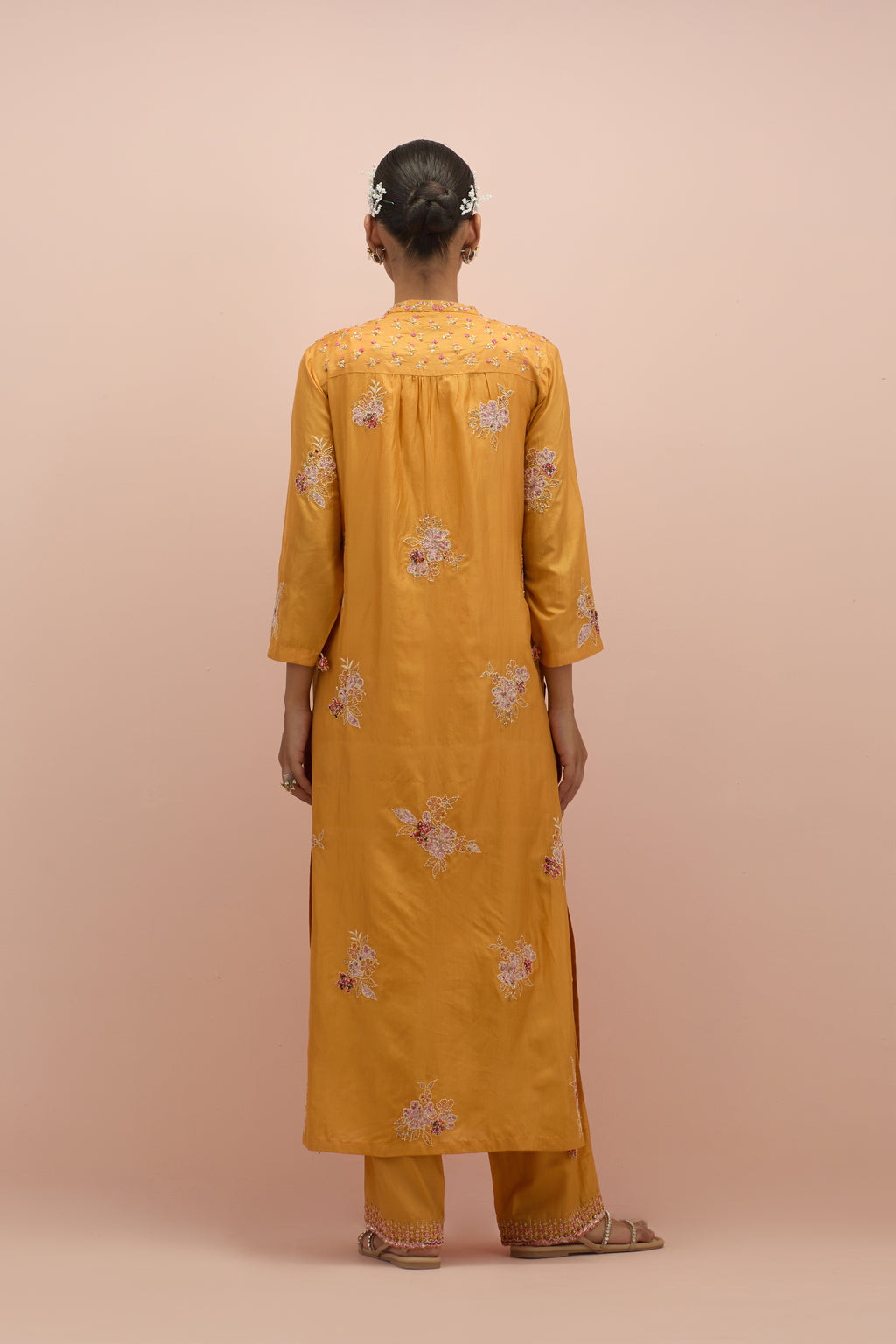 Amber straight kurta set with all-over delicate embroidered flowers, highlighted with sequins and multi-colored beads.