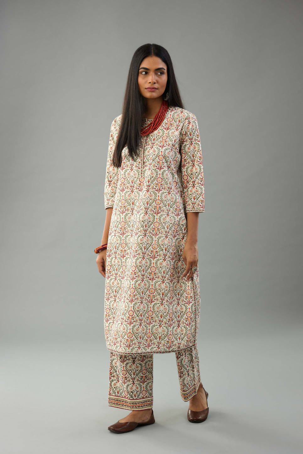 Red & green hand block printed cotton straight kurta with all-over multi colored jaal print.