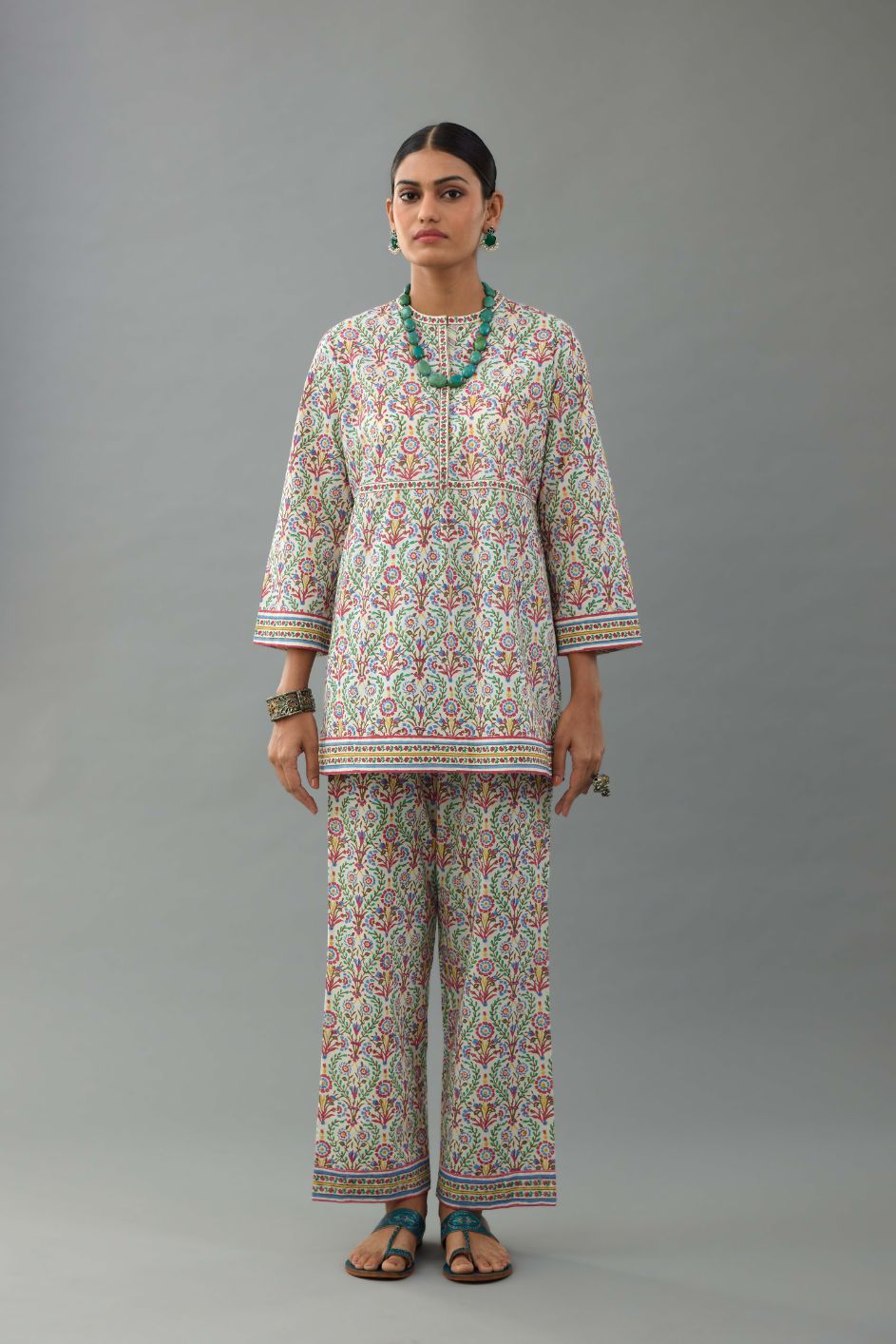 Blue & pink cotton short top with all-over hand block print, paired with blue and pink hand block printed cotton straight pants.