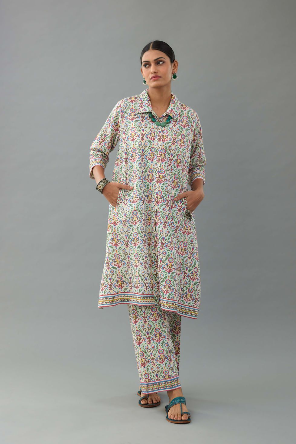 Blue & pink cotton A-line short kurta with all over multi colored jaal hand block print.