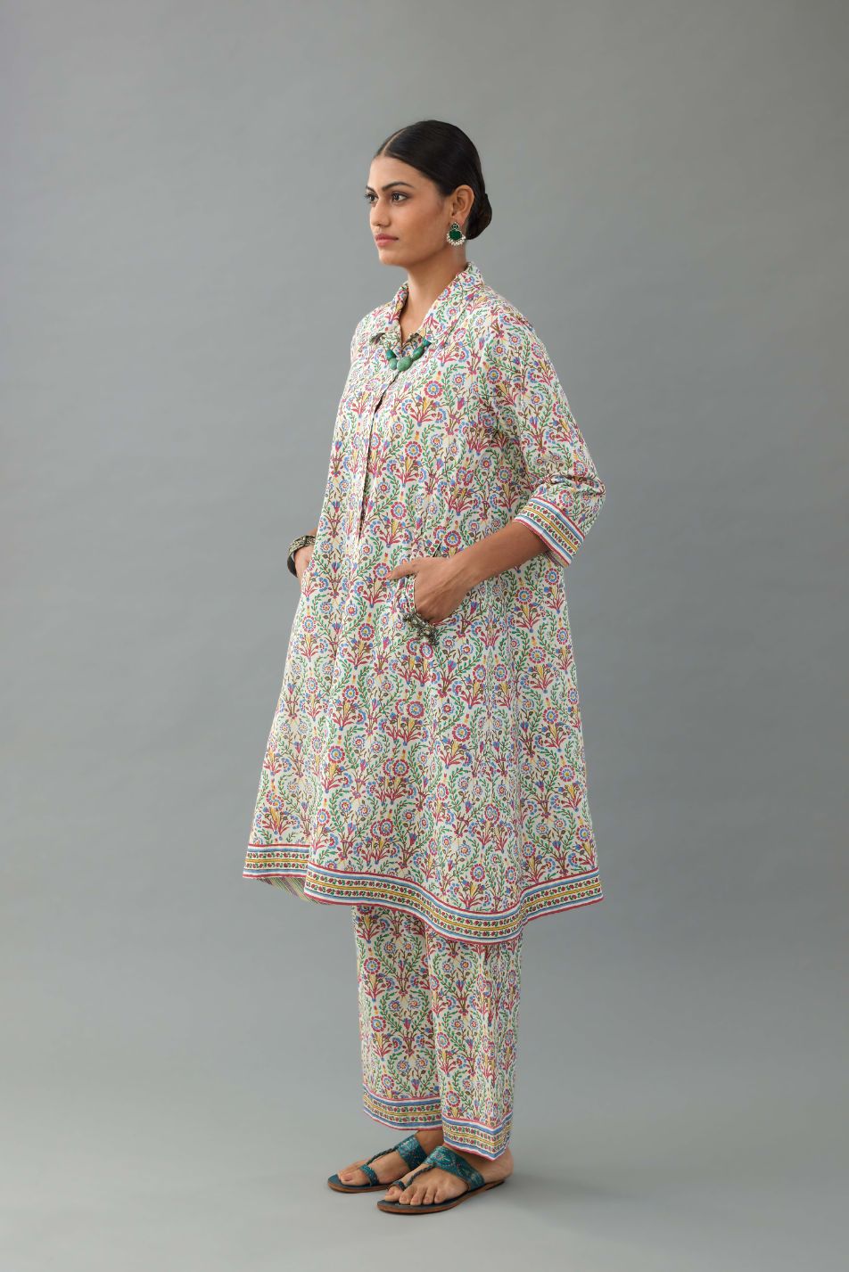 Blue & pink cotton A-line short kurta with all over multi colored jaal hand block print.