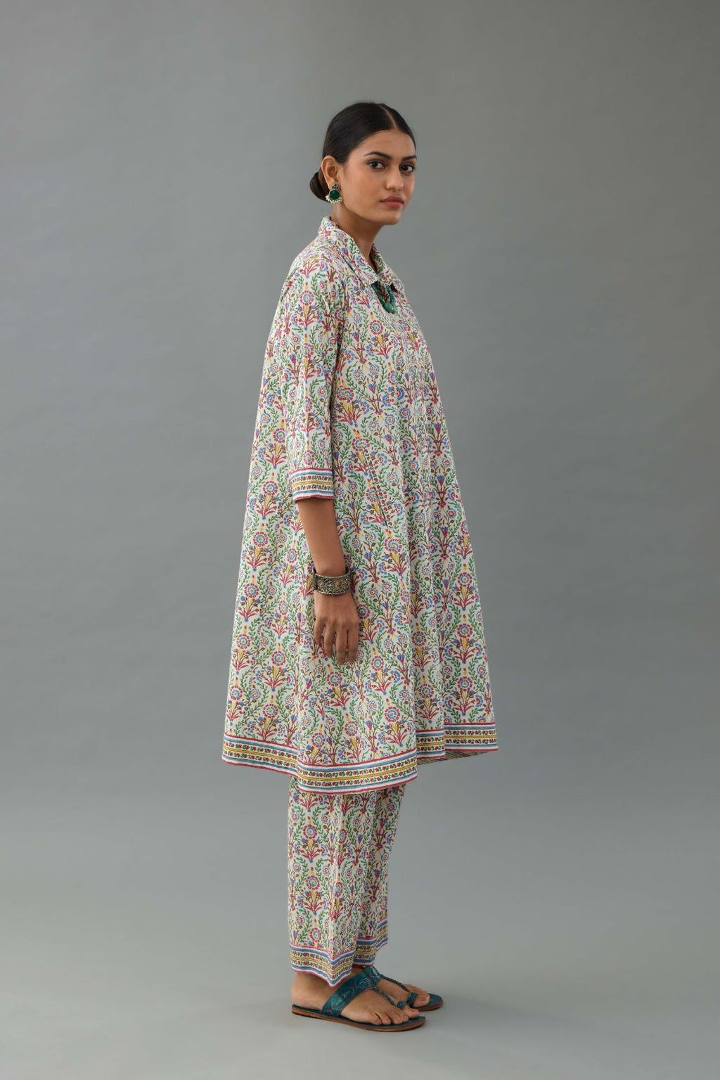 Blue & pink cotton A-line short kurta with all over multi colored jaal hand block print.