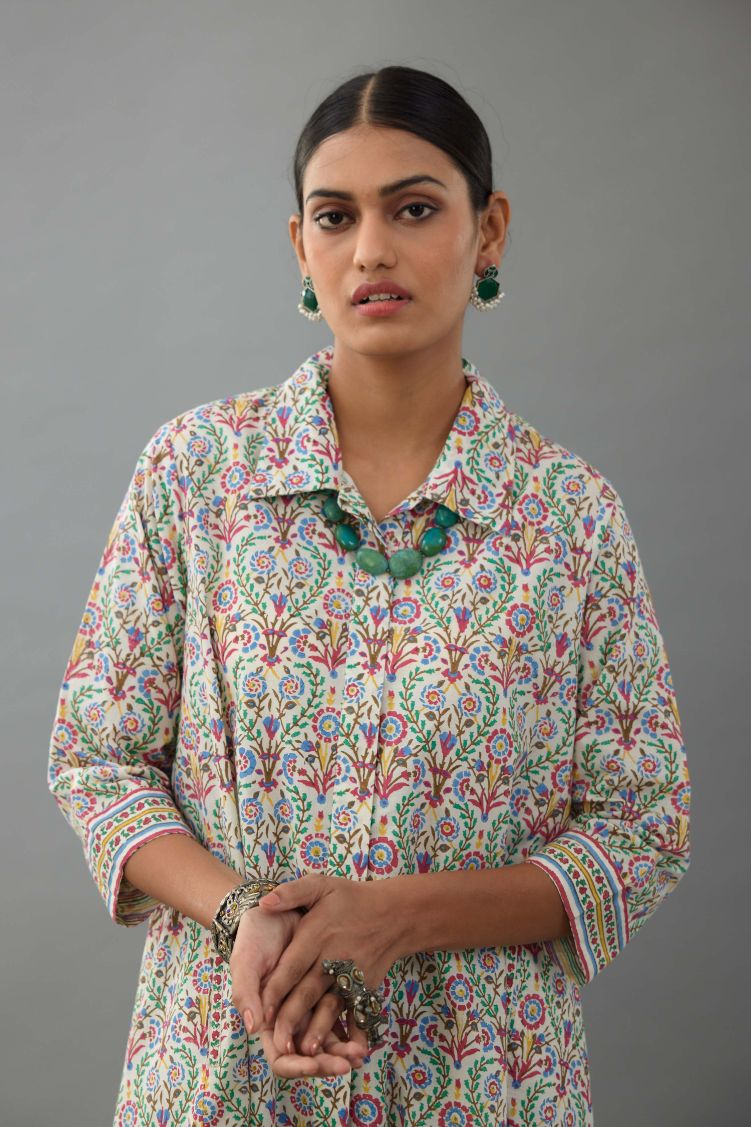 Blue & pink cotton A-line short kurta with all over multi colored jaal hand block print.