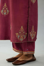 Wine silk chanderi straight kurta set with zari, dori and contrast silk thread embroidered bootas, highlighted with gold sequins work.