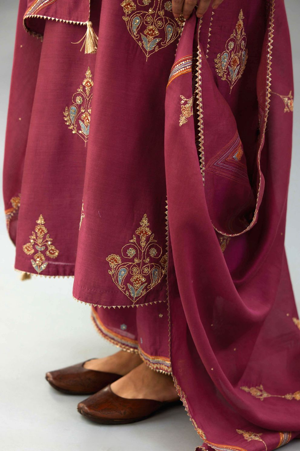 Wine Silk chanderi dupatta in chevron pattern embroidery with contrast silk thread and dori at the sides.