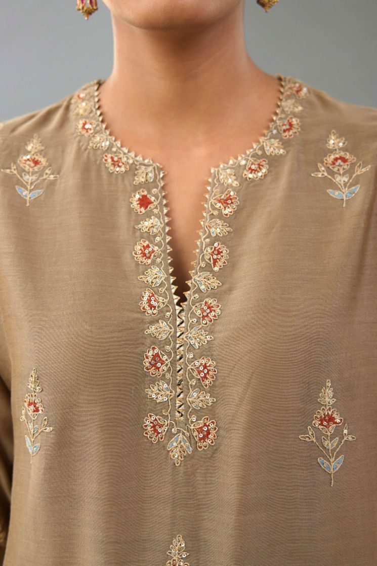 Taupe silk chanderi straight kurta set with all-over zari, dori and contrast silk thread embroidery, highlighted with gold sequins work.