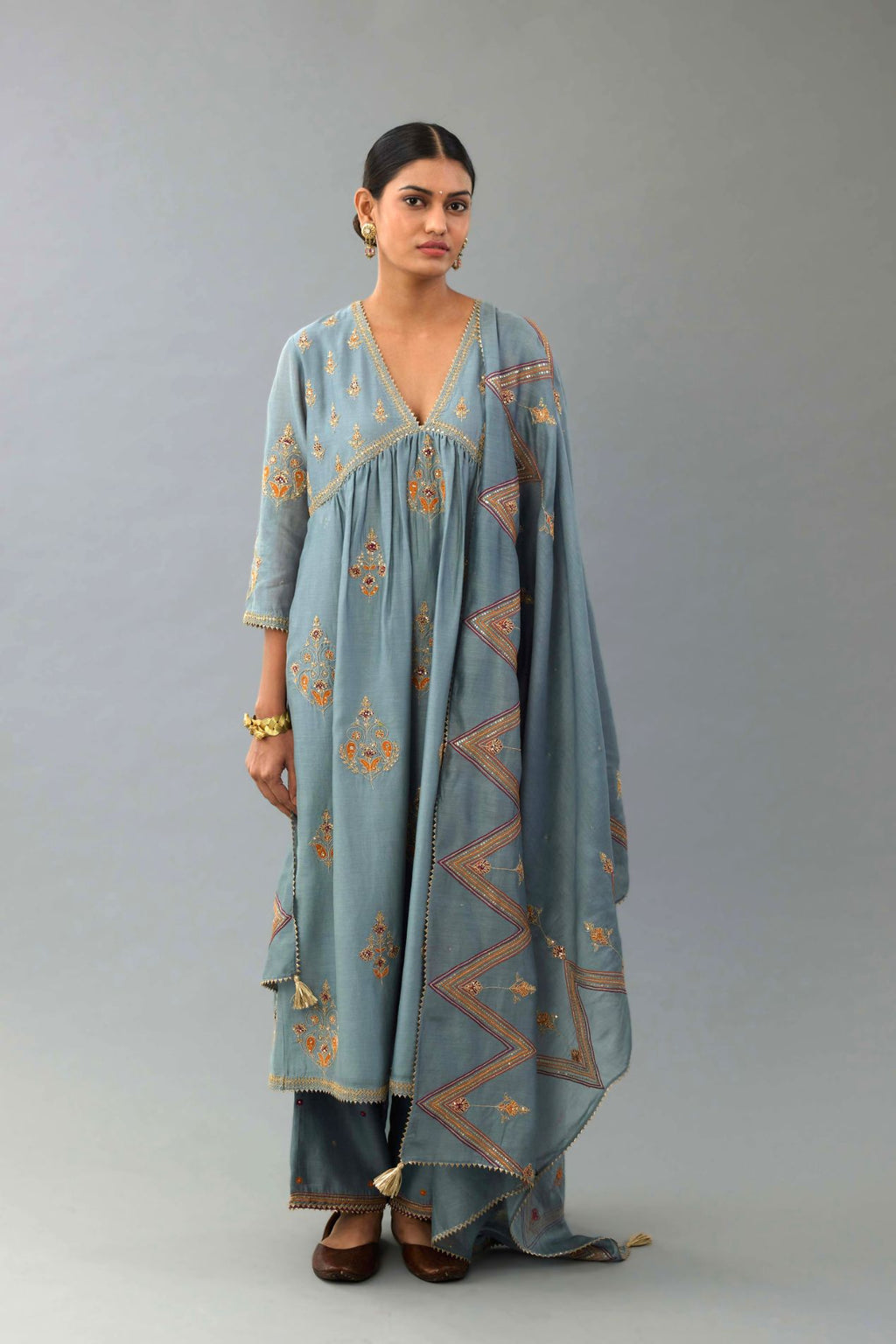 Light blue Silk chanderi dupatta in chevron pattern embroidery with contrast silk thread and dori at the sides.