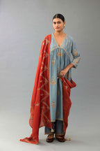Light blue silk chanderi kurta-dress set with all-over zari, dori and contrast silk thread embroidery, highlighted with gold sequins work.