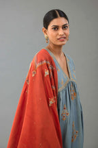 Light blue silk chanderi kurta-dress set with all-over zari, dori and contrast silk thread embroidery, highlighted with gold sequins work.