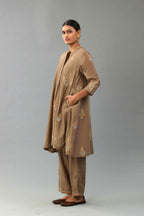 Taupe Silk Chanderi short kurta set with collar and front placket, detailed with delicate gold embroidery is done around the placket and collar.