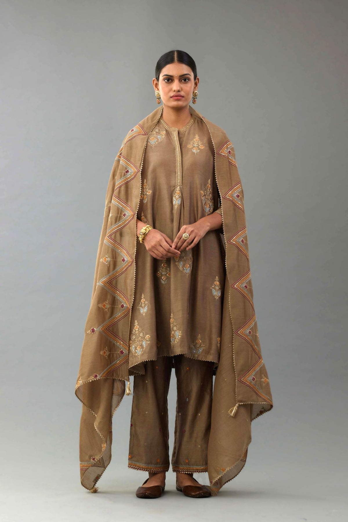 Taupe Silk chanderi dupatta in chevron pattern embroidery with contrast silk thread and dori at the sides.