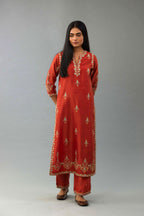 Rust silk chanderi straight kurta set with all-over zari, dori and contrast silk thread embroidery, highlighted with gold sequins work.