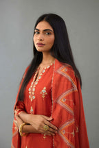 Rust silk chanderi straight kurta set with all-over zari, dori and contrast silk thread embroidery, highlighted with gold sequins work.