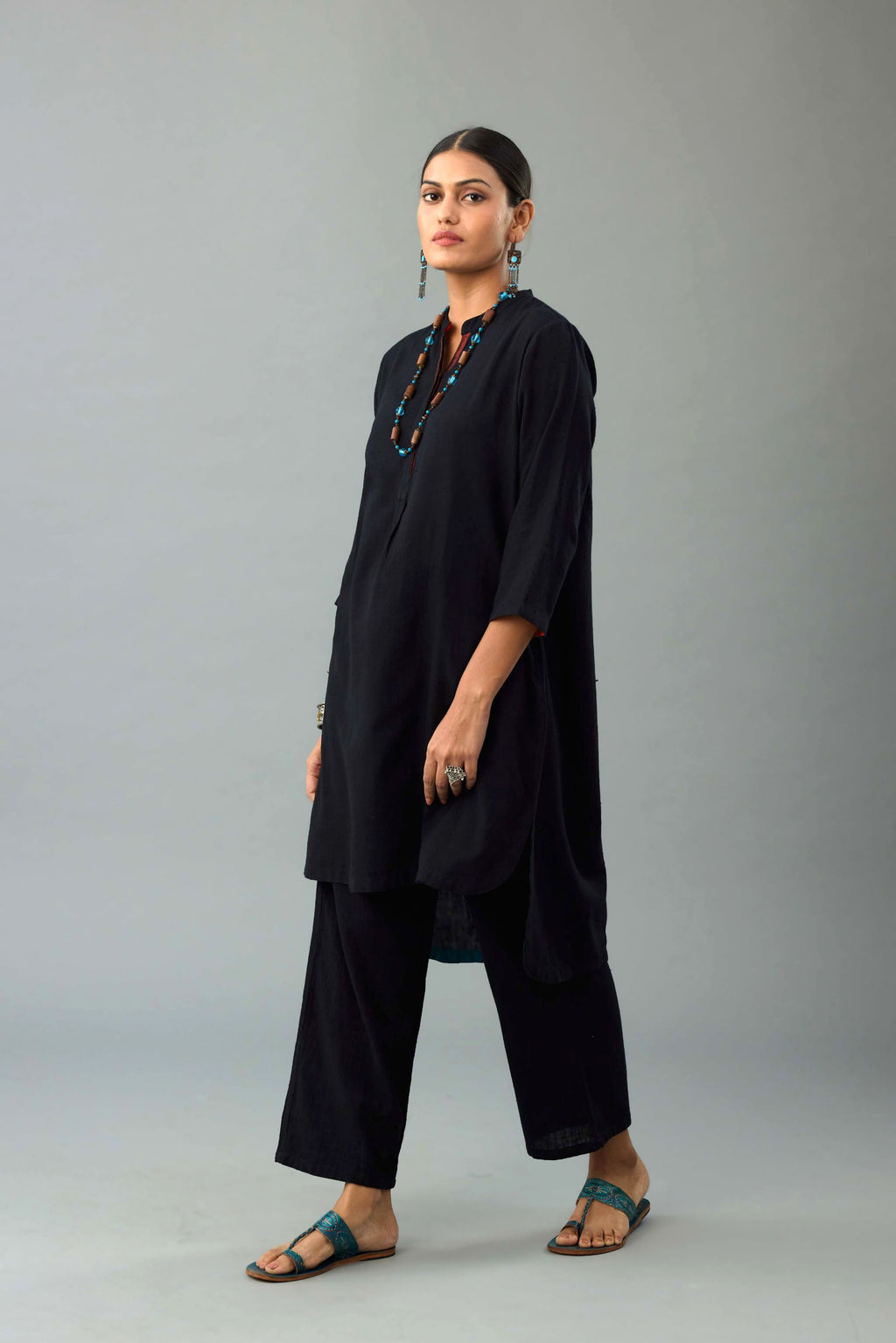 Black Handloom Cotton kurta set with collar neckline and 3/4 sleeves.