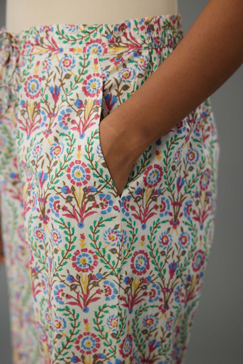 Blue & pink cotton short top with all-over hand block print, paired with blue and pink hand block printed cotton straight pants.