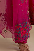Fuchsia knee length A-line kurta set, highlighted with dull gold zari and sequins handwork.