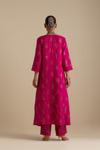 Fuchsia silk straight long kurta set, highlighted with dull gold zari and sequins handwork.
