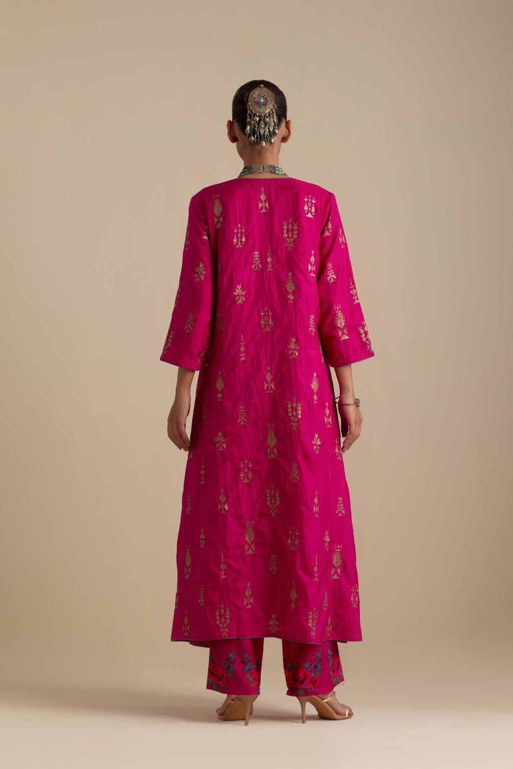 Fuchsia silk straight long kurta set, highlighted with dull gold zari and sequins handwork.