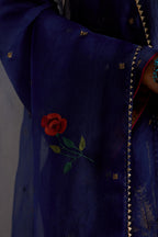 Blue silk A-line short kurta set, highlighted with dull gold zari and sequins handwork.