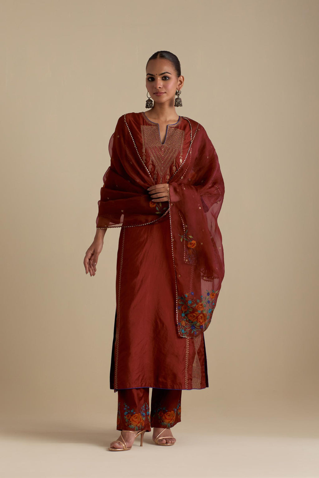 Maroon silk organza dupatta, highlighted with delicate dull gold sequins work and all-over thread embroidery roses, with a large bunch at the dupatta corners.