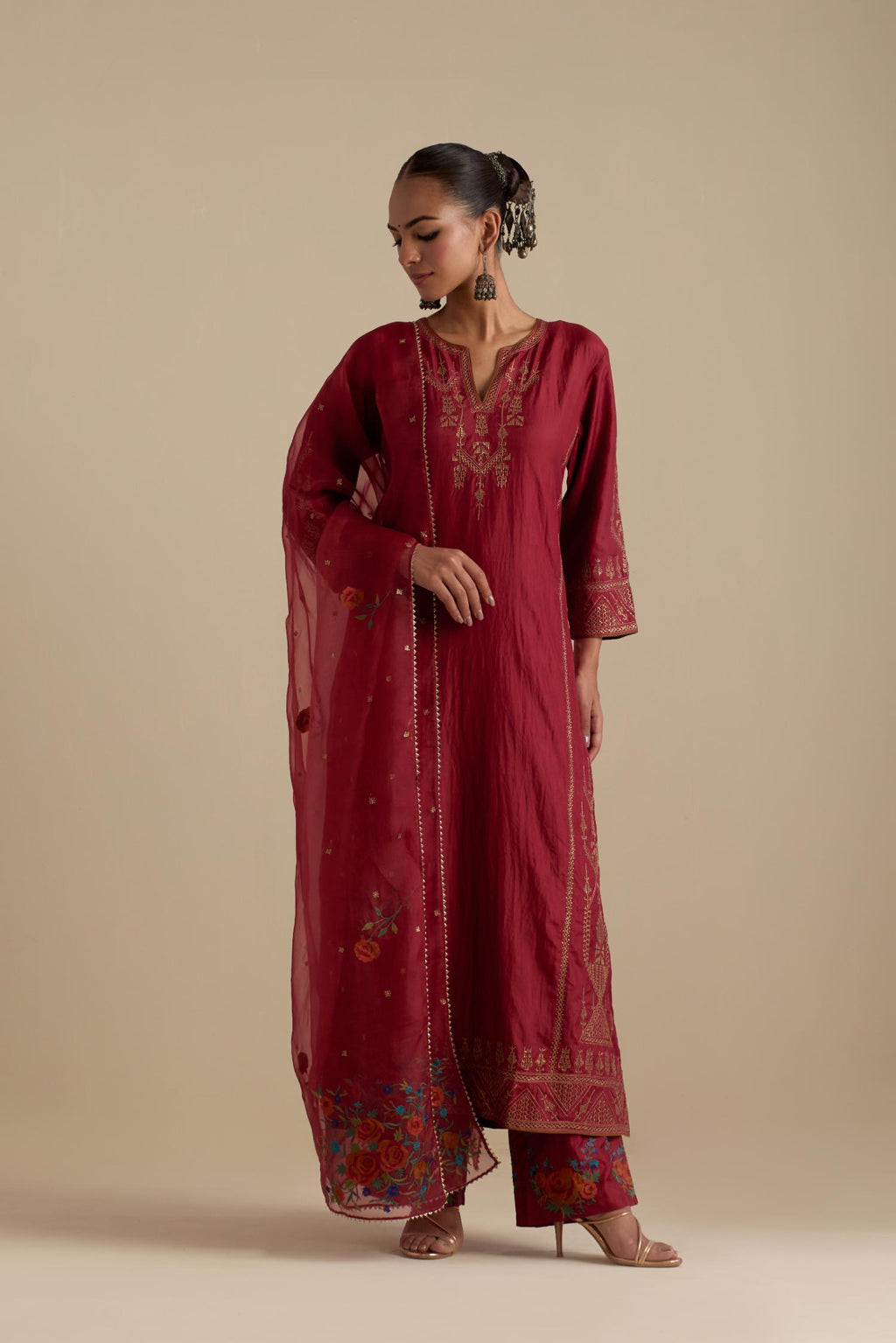 Barn red silk organza dupatta, highlighted with delicate dull gold sequins work and all-over thread embroidery roses, with a large bunch at the dupatta corners.