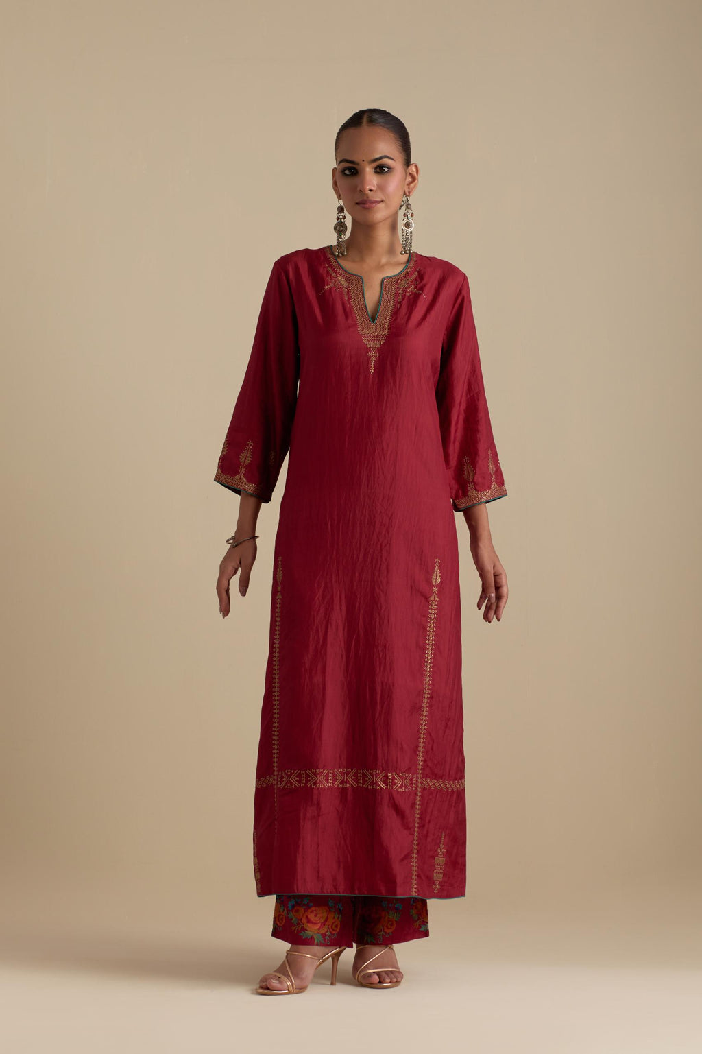 Barn red silk straight kurta set, highlighted with dull gold zari and sequins handwork