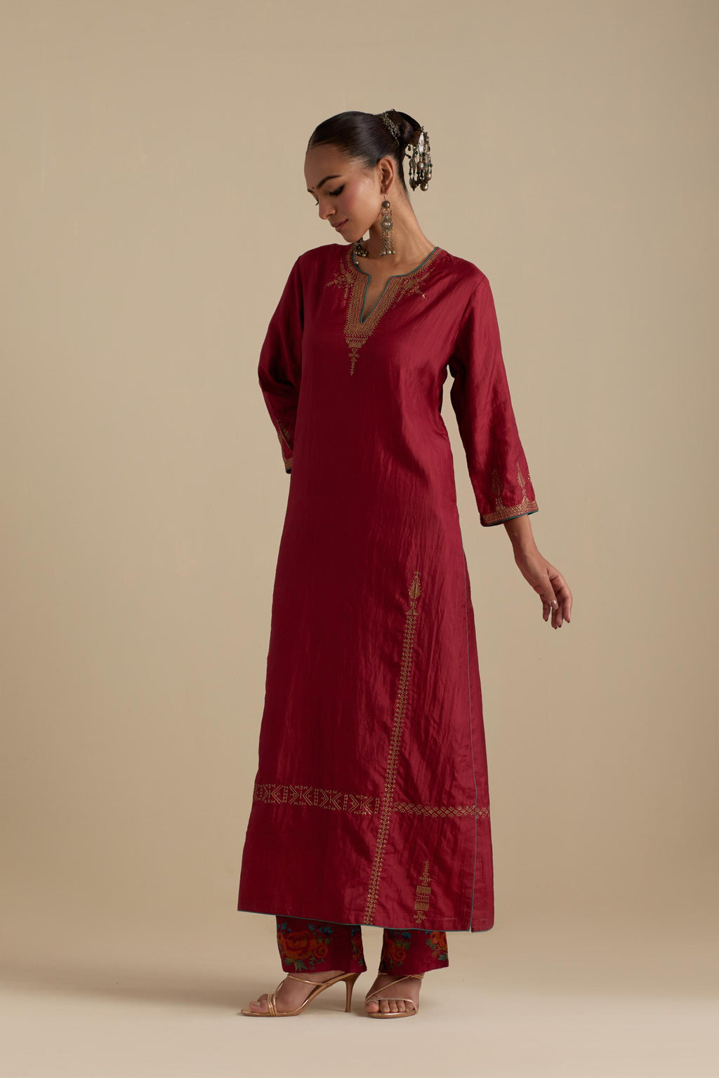 Barn red silk straight kurta set, highlighted with dull gold zari and sequins handwork