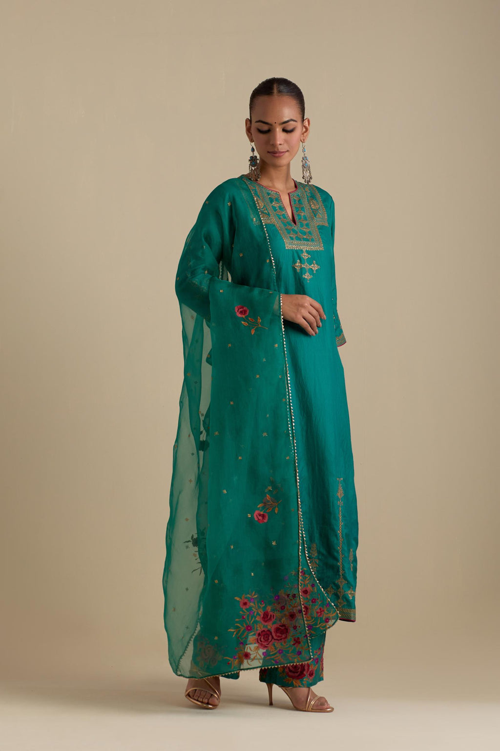 Persian green silk organza dupatta, highlighted with delicate dull gold sequins work and all-over thread embroidery roses, with a large bunch at the dupatta corners.