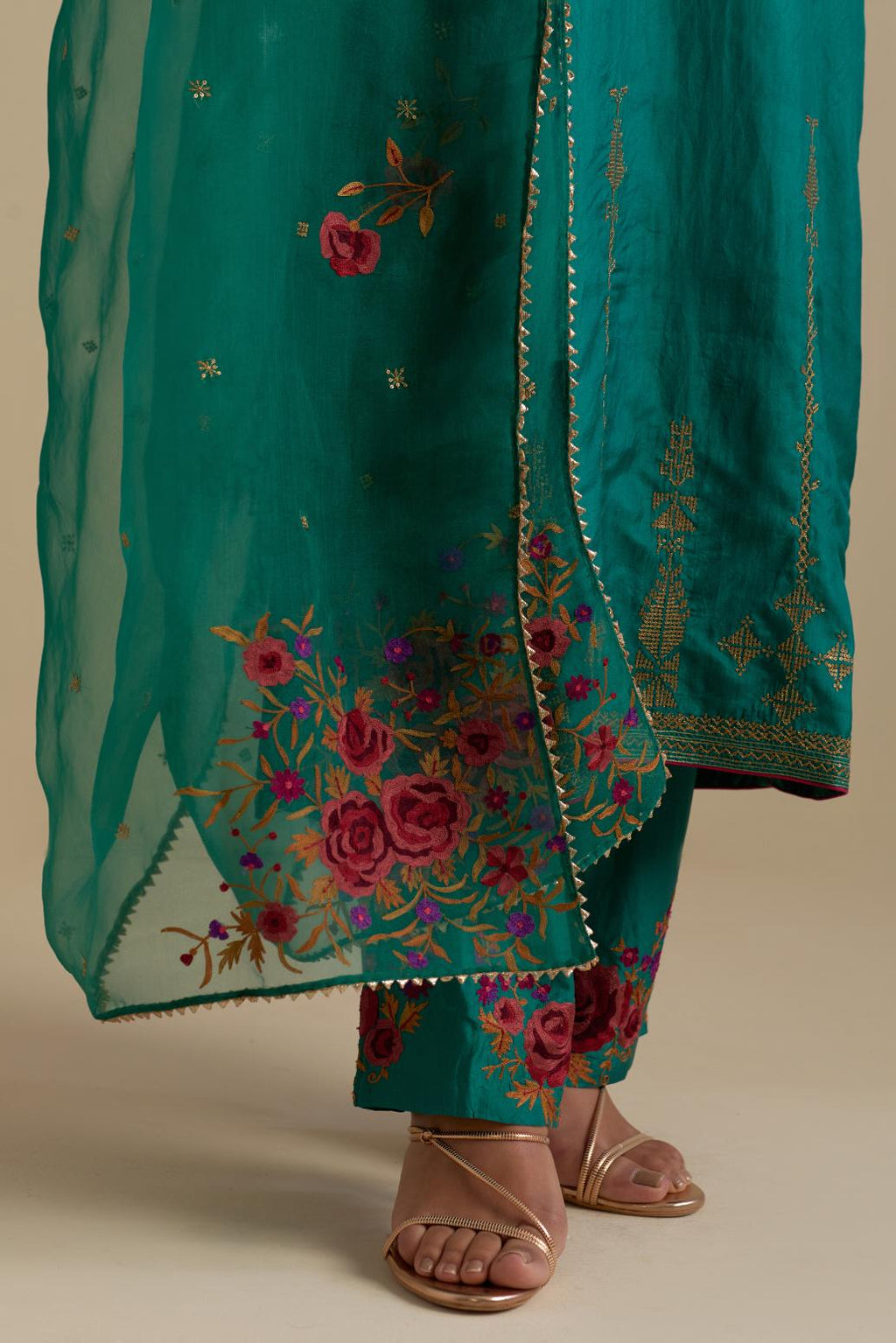 Persian green silk organza dupatta, highlighted with delicate dull gold sequins work and all-over thread embroidery roses, with a large bunch at the dupatta corners.