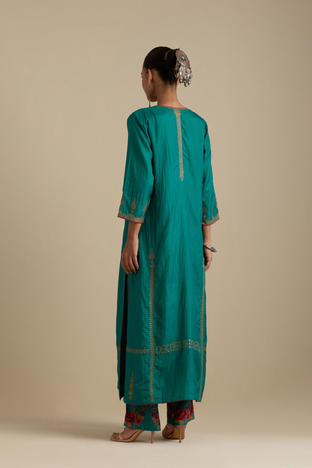 Persian green silk straight kurta set, highlighted with dull gold zari and sequins handwork