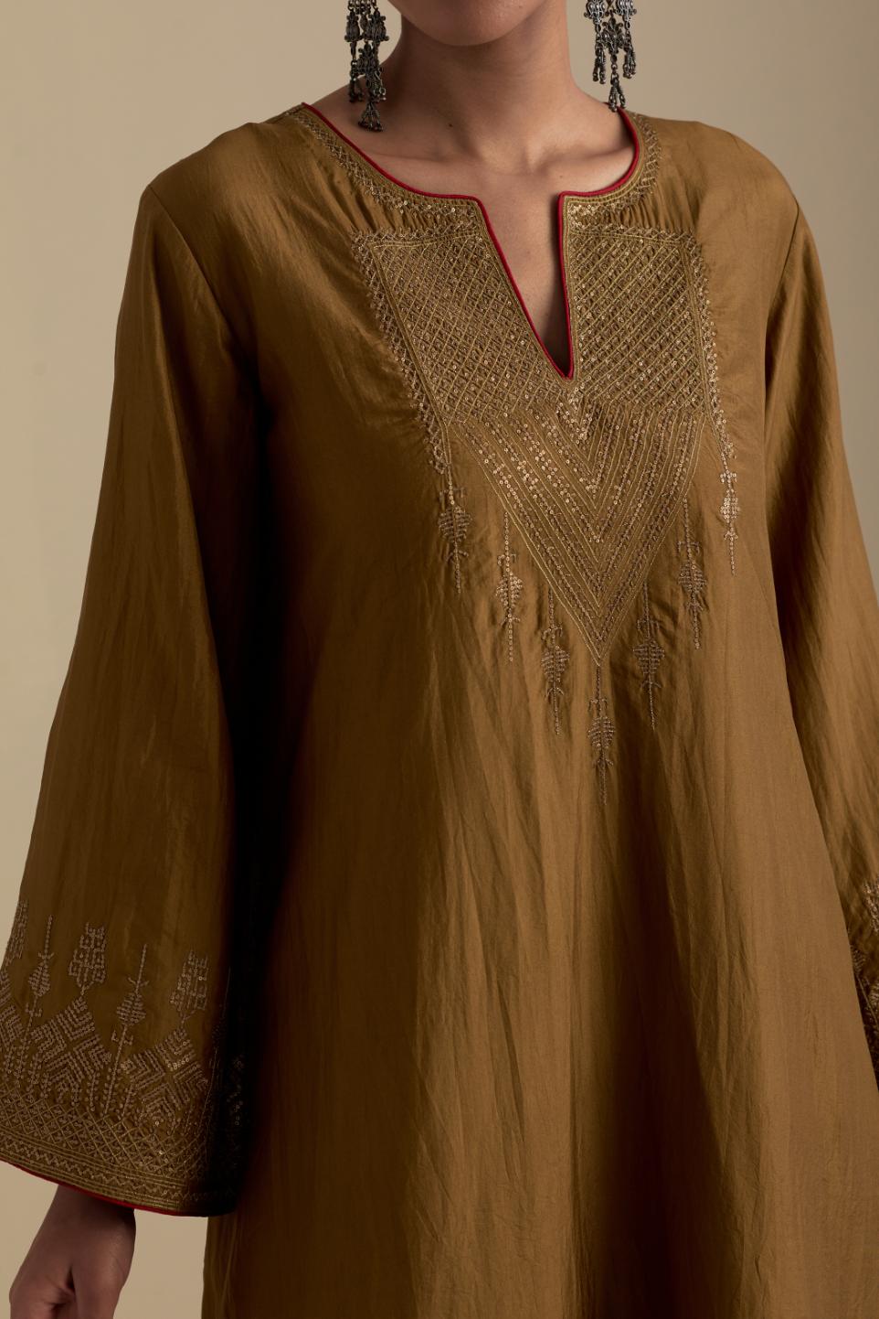 Olive knee length A-line kurta set, highlighted with dull gold zari and sequins handwork.