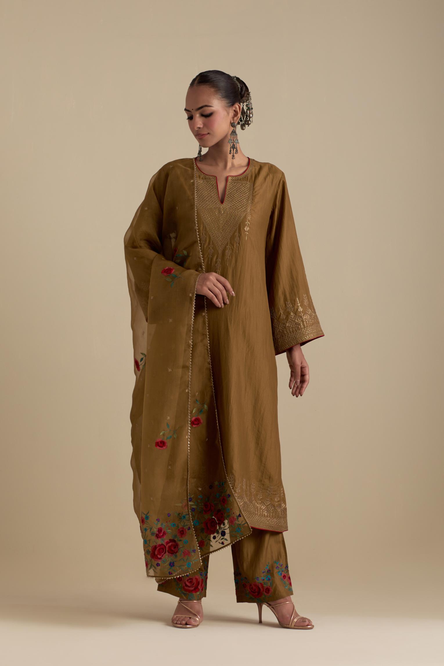 Olive knee length A-line kurta set, highlighted with dull gold zari and sequins handwork.