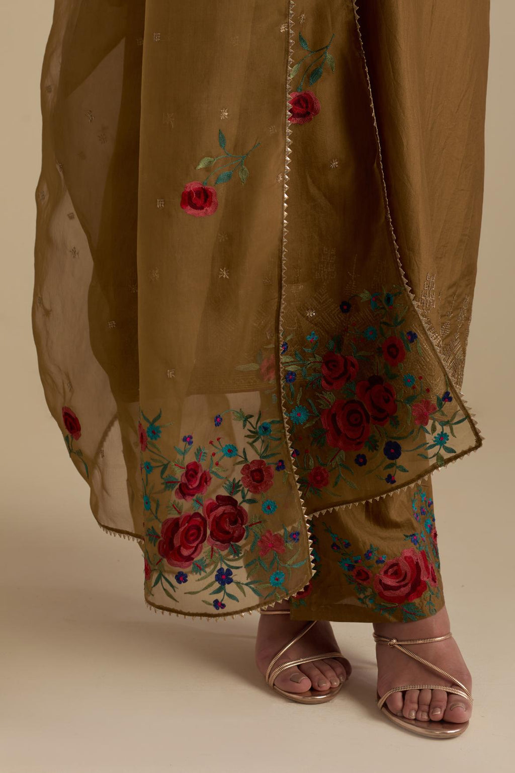 Olive silk organza dupatta, highlighted with delicate dull gold sequins work and all-over thread embroidery roses, with a large bunch at the dupatta corners.