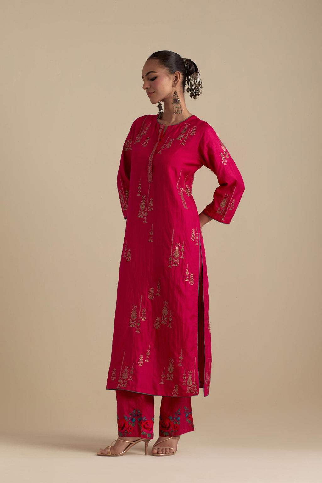 Fuchsia silk straight kurta set, highlighted with dull gold zari and sequins handwork.