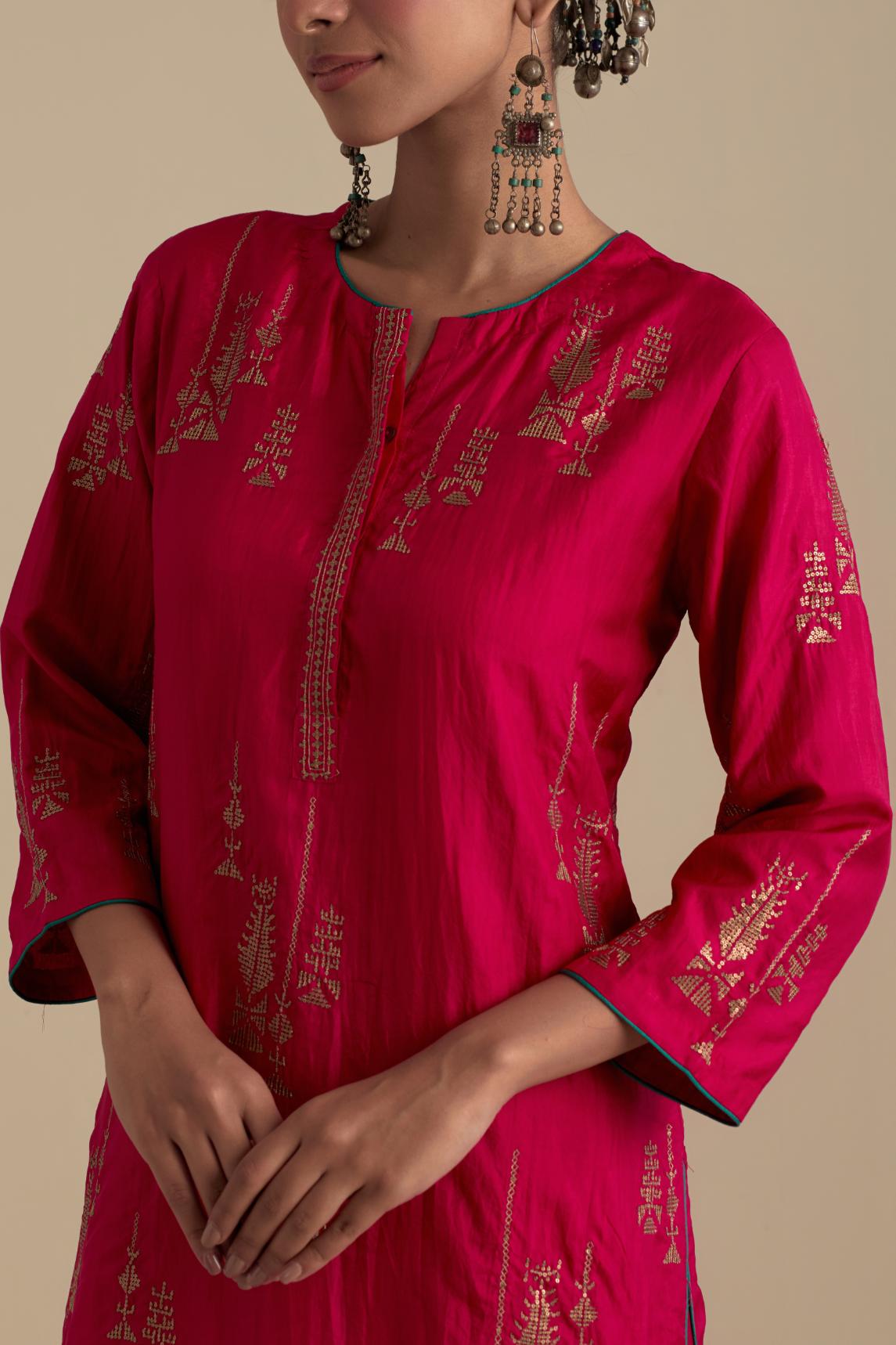 Fuchsia silk straight kurta set, highlighted with dull gold zari and sequins handwork.