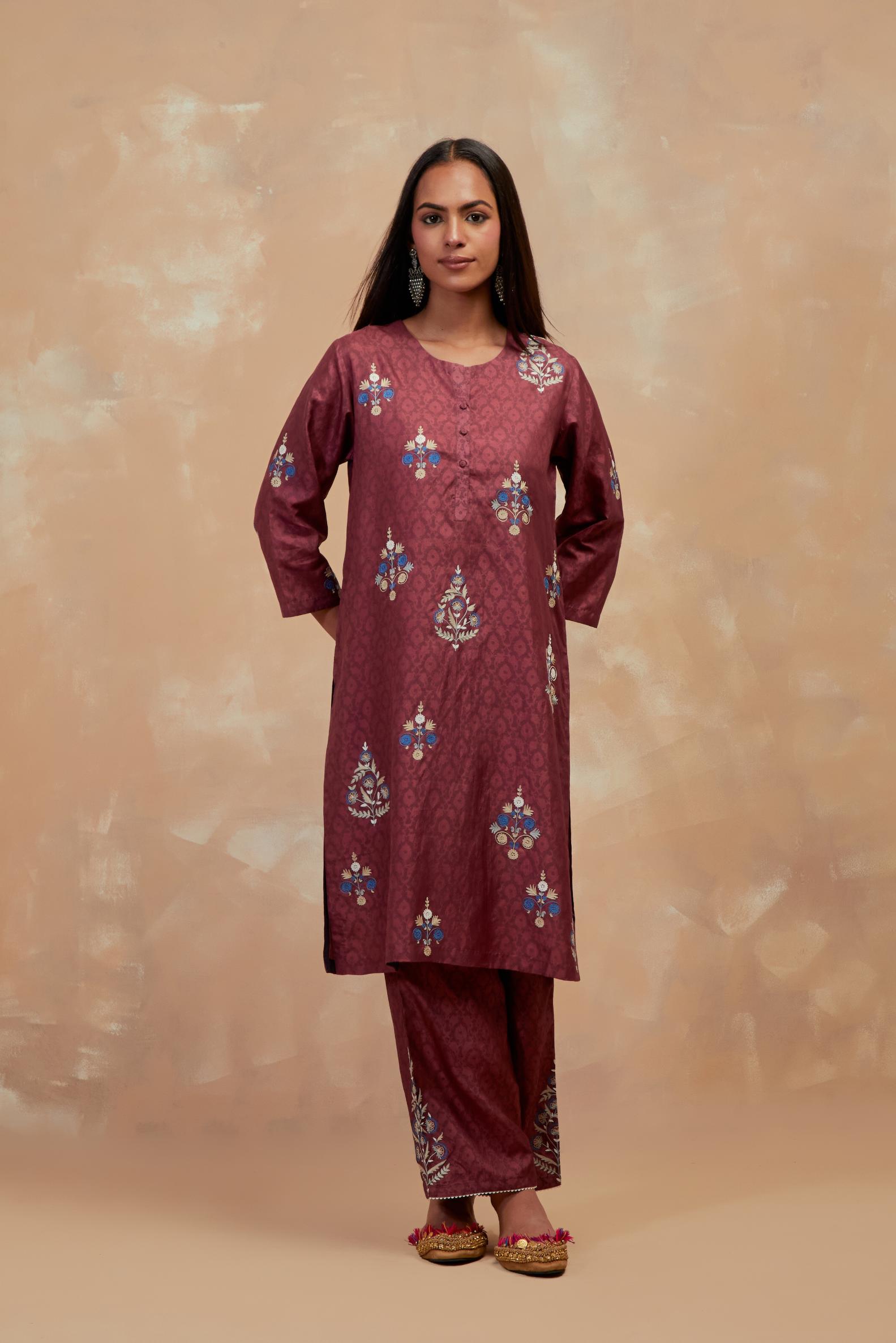Deep berry silk hand block printed short kurta set, highlighted with multi colored silk thread embroidery.