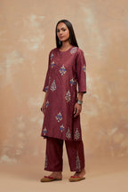 Deep berry silk hand block printed short kurta set, highlighted with multi colored silk thread embroidery.