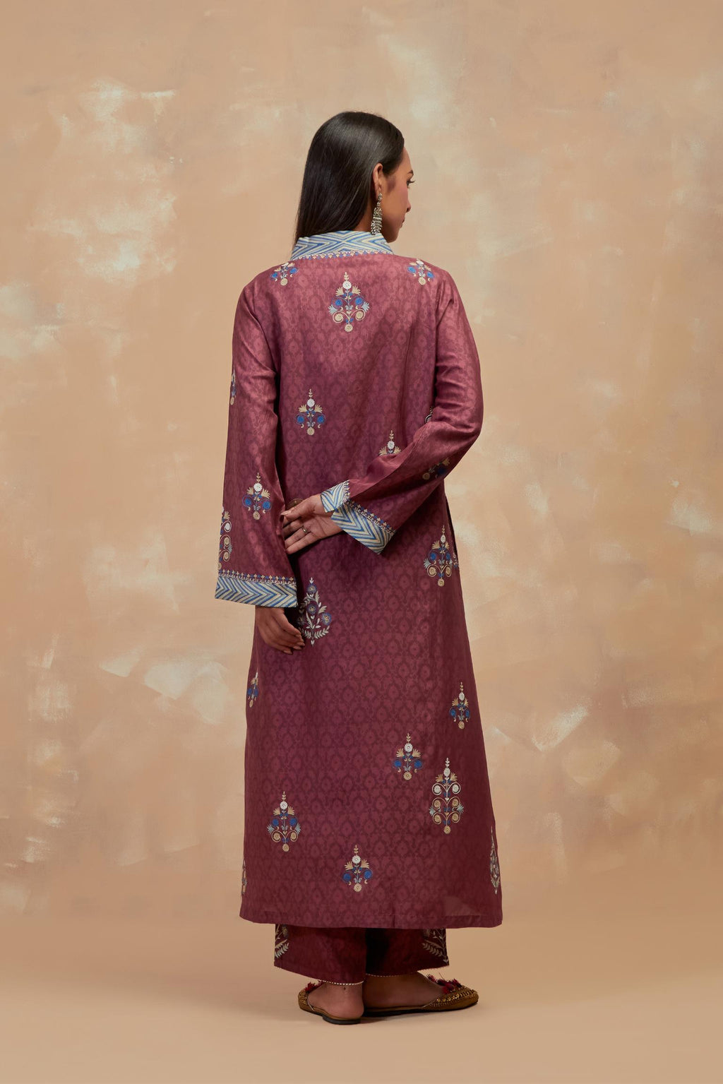 Deep berry silk hand block printed easy fit kurta set, highlighted multicolored silk thread embroidery.
