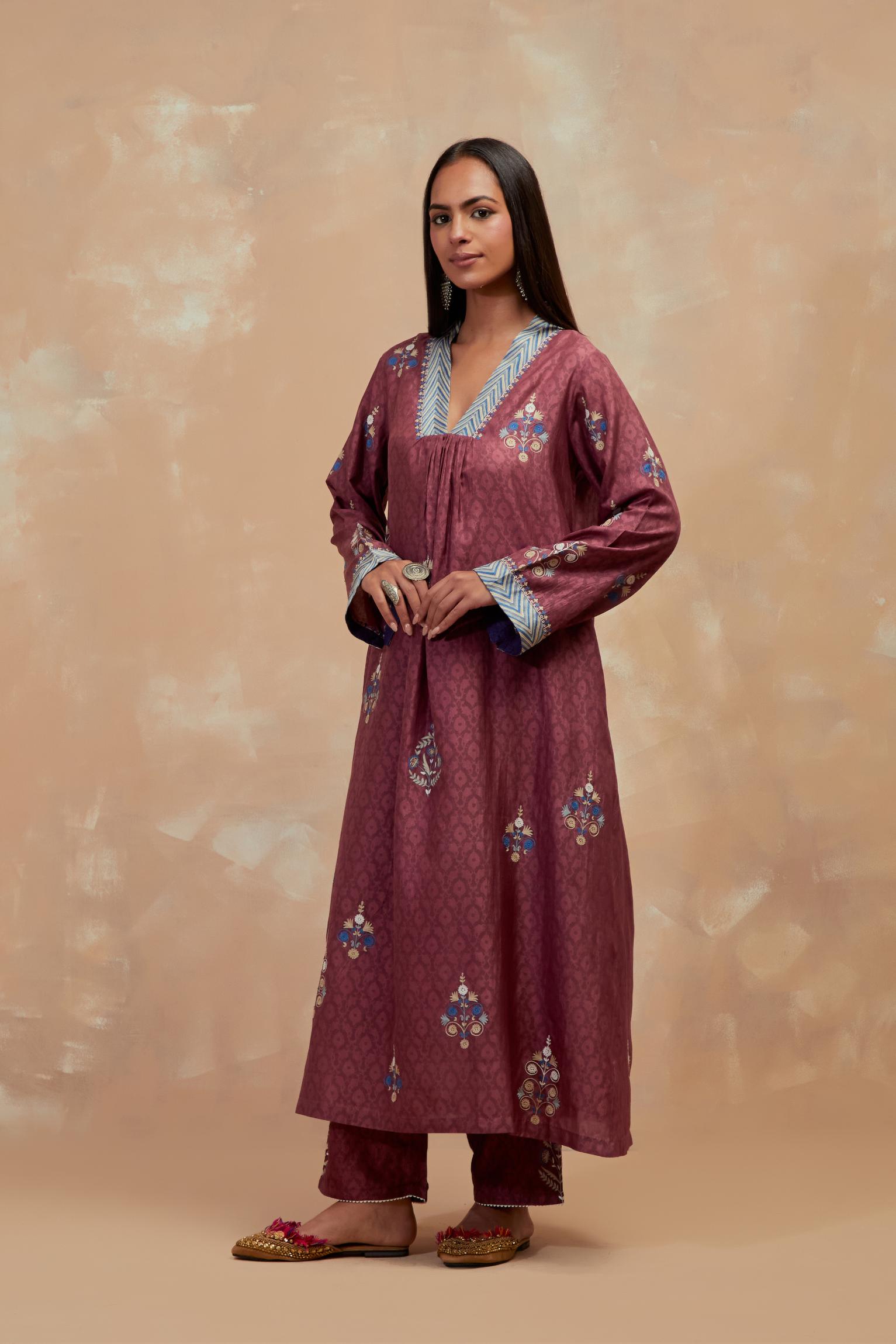 Deep berry silk hand block printed easy fit kurta set, highlighted multicolored silk thread embroidery.