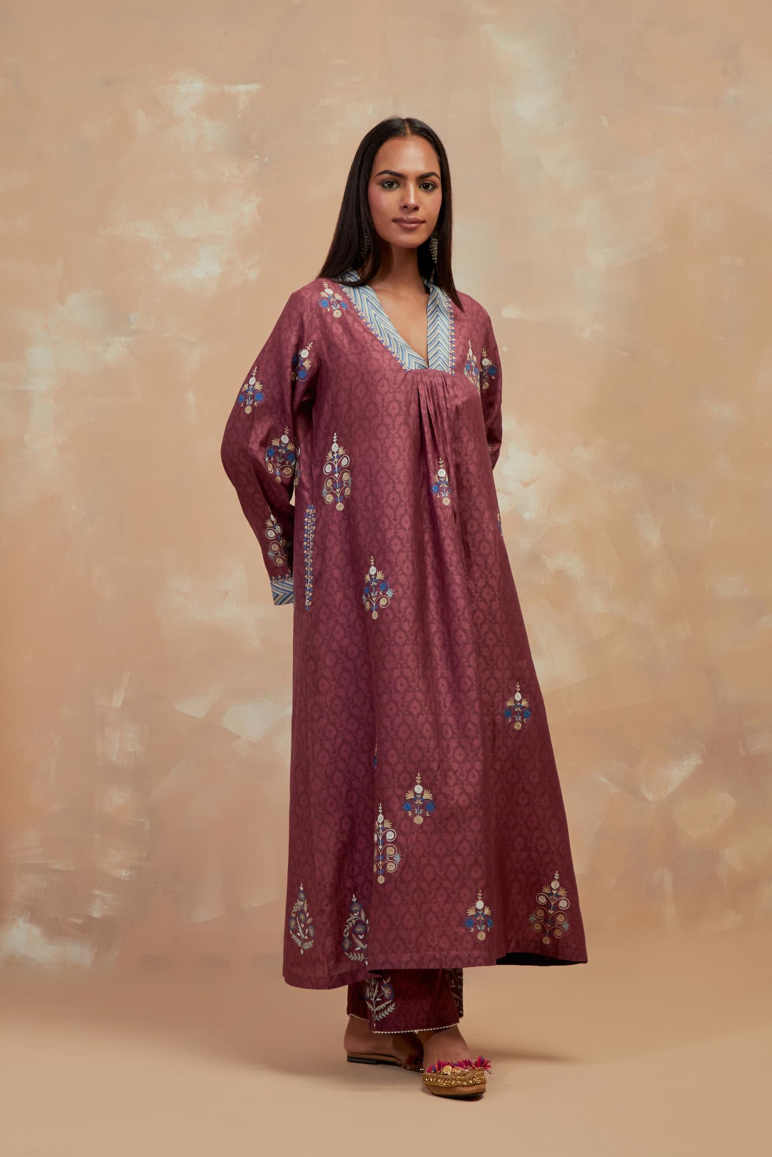 Deep berry silk hand block printed easy fit kurta set, highlighted multicolored silk thread embroidery.