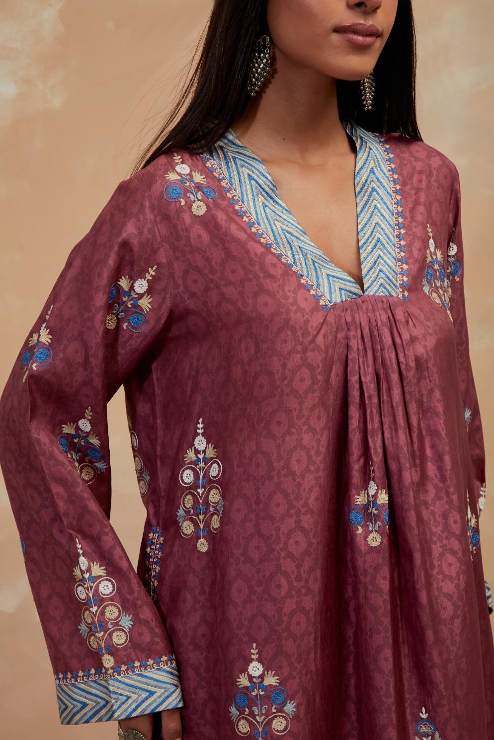 Deep berry silk hand block printed easy fit kurta set, highlighted multicolored silk thread embroidery.