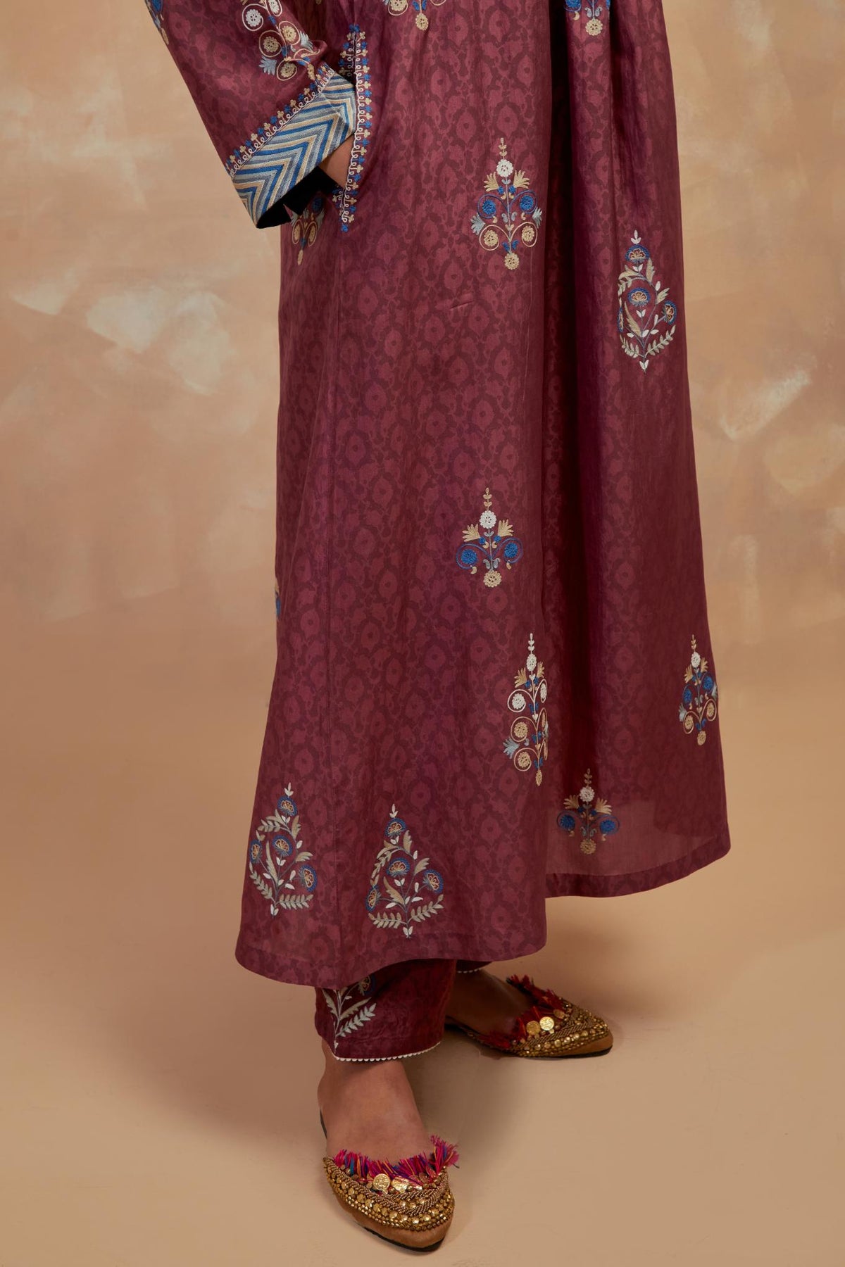 Deep berry silk hand block printed easy fit kurta set, highlighted multicolored silk thread embroidery.