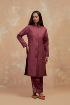 Deep berry silk, quilted mid- length front open jacket with all-over hand block print.
