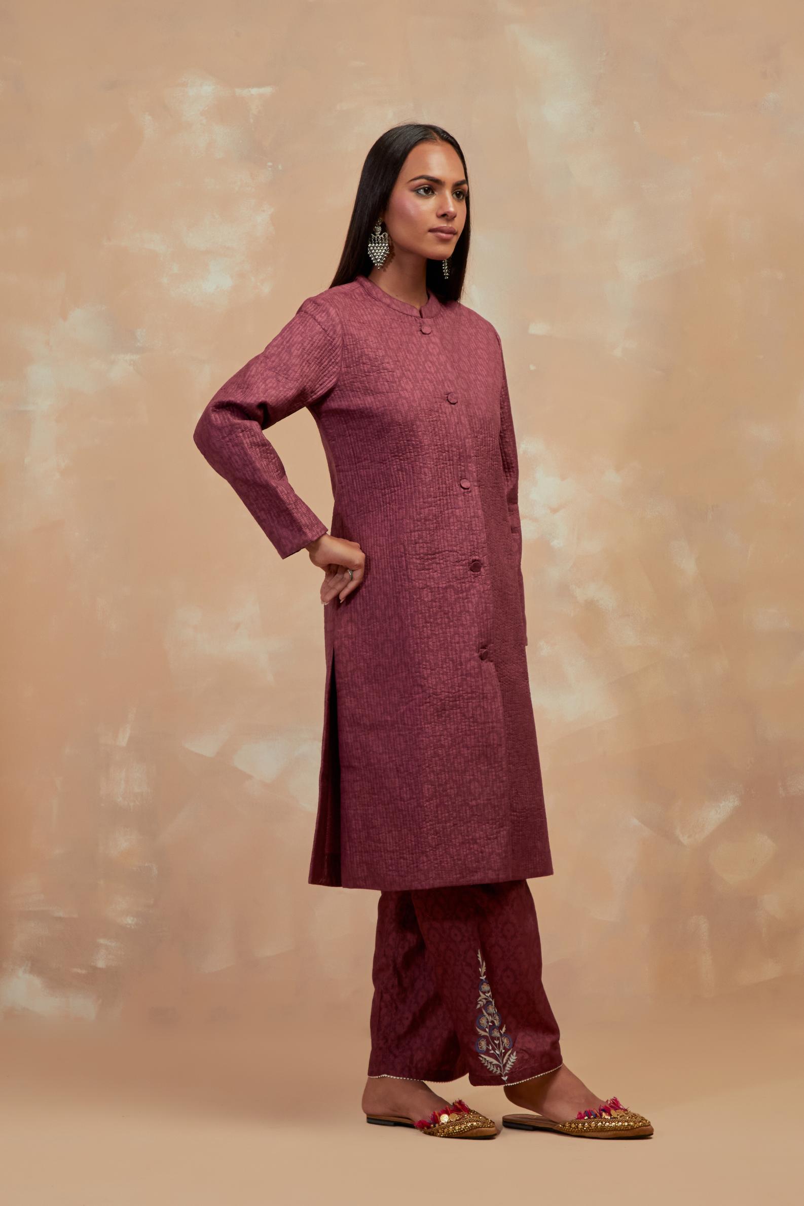 Deep berry silk, quilted mid- length front open jacket with all-over hand block print.