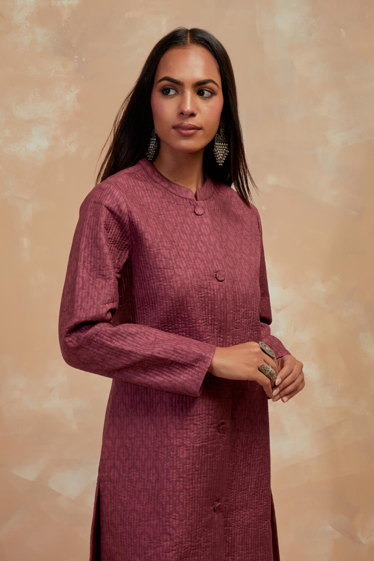 Deep berry silk, quilted mid- length front open jacket with all-over hand block print.