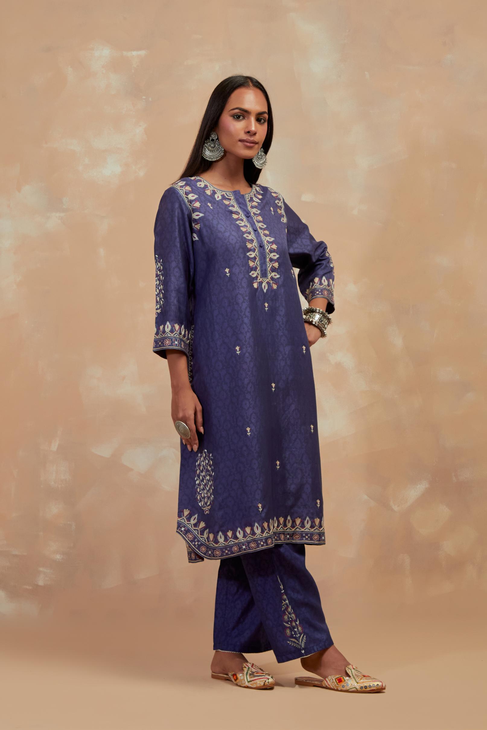 Ford blue silk hand block printed short kurta set with round hem and multi colored silk thread embroidery all over the kurta.