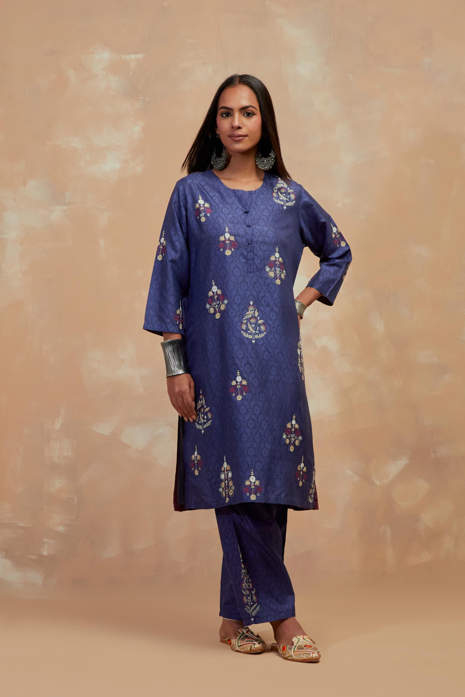 Ford blue silk hand block printed short kurta set, highlighted with multi colored silk thread embroidery.
